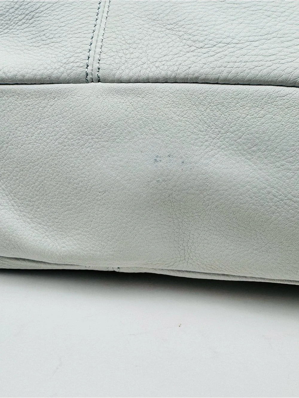 B. Makowsky Leather Ivory Hobo handbag. Gold-tone stud accent hardware.